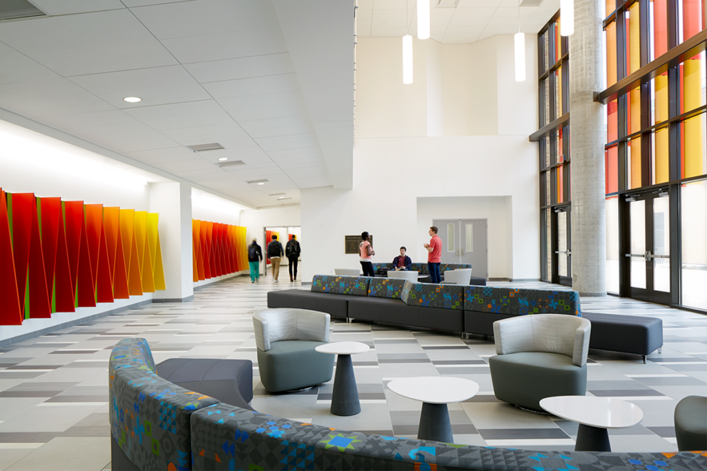 A blend of comfort and durability, the lounge seating in the entrance lobby creates a lively space for students to convene.