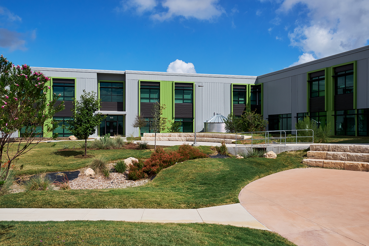 Native planting landscaping is irrigated by a catchment system in the central courtyard.