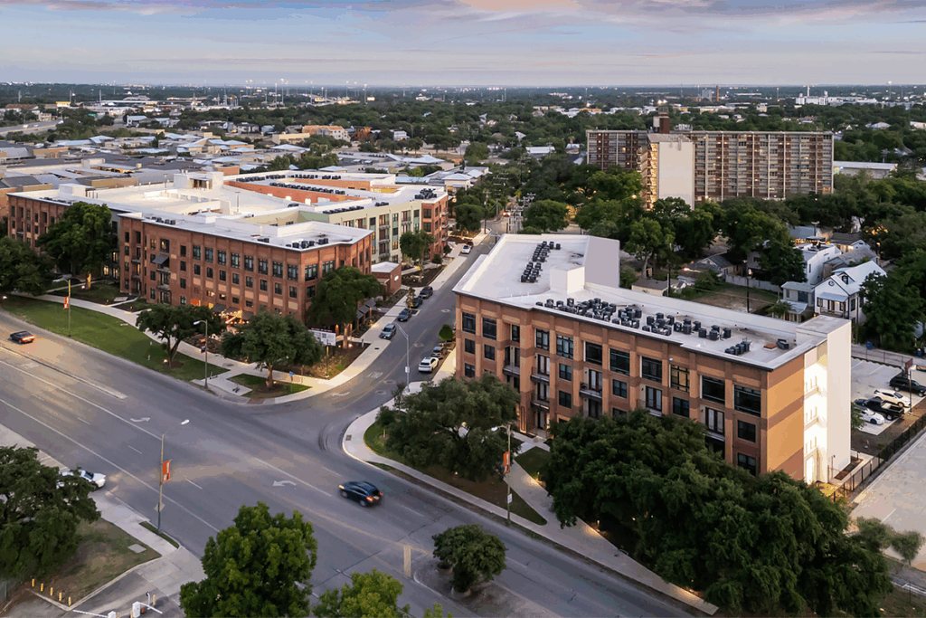 Four story apartment buildings afford prime views of the downtown skyline. Photo, Matthew Niemann.