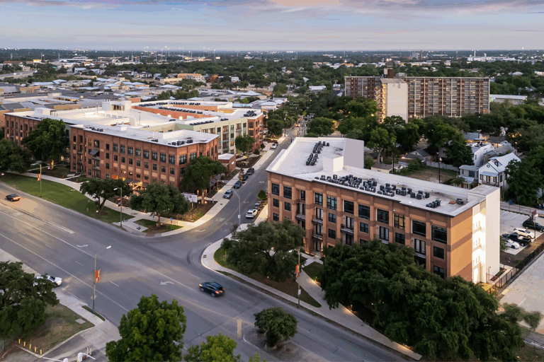 Four story apartment buildings afford prime views of the downtown skyline. Photo, Matthew Niemann.