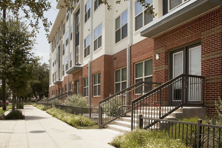 Stoops along Evergreen Street create an urban neighborhood public realm.