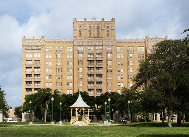 The Aurora overlooks Crockett Park, with downtown skyline views beyond.