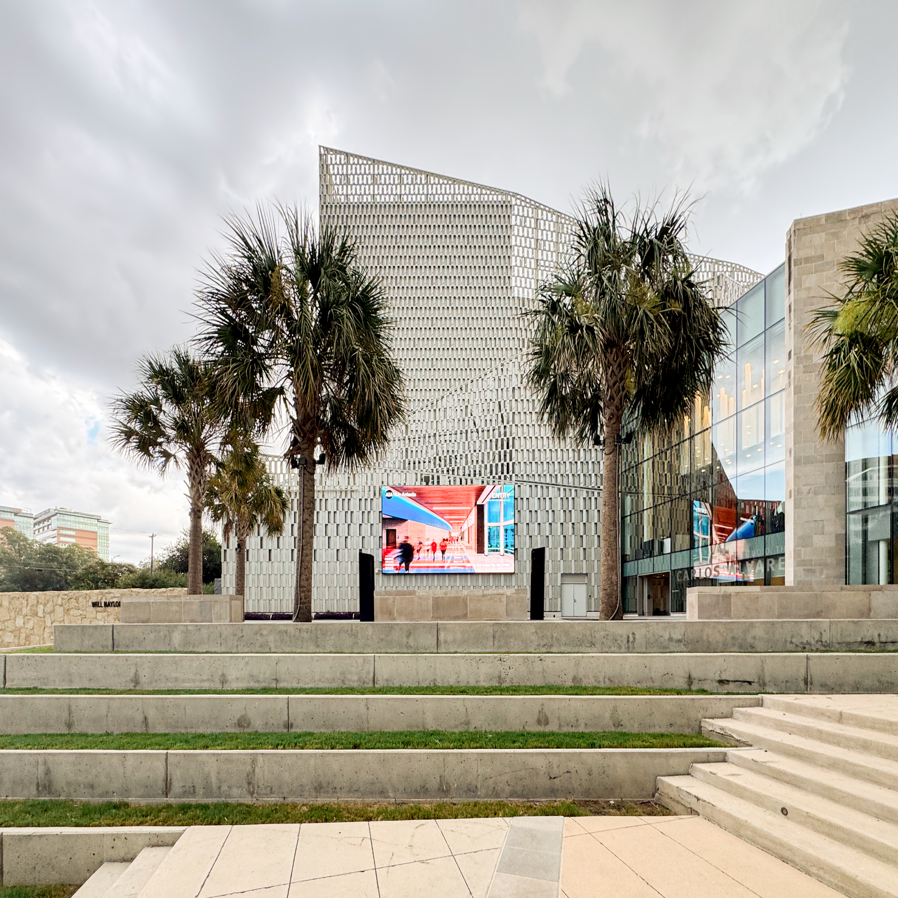 NISD John Jay High School Fine Arts Addition in the Place Awards slide show looping at the Tobin Center’s River Walk terrace. Photo, Juan Fernando Ortega, AIA.