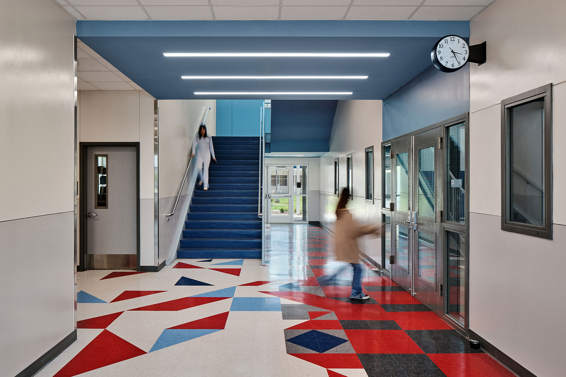Playful patterns, which get denser as they approach the gym, signal a transition from academics to sport.